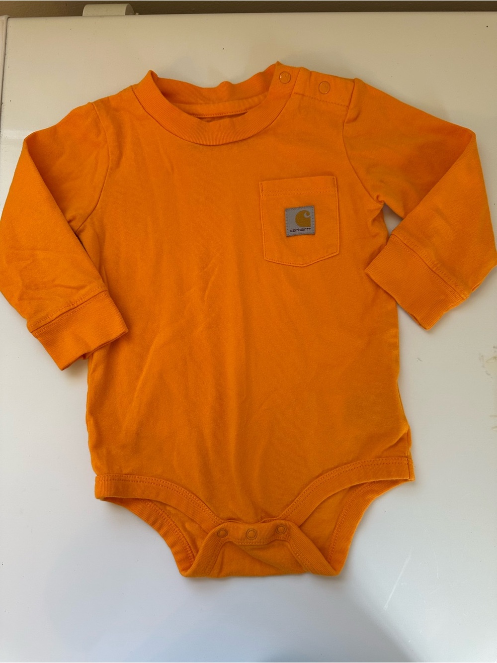 Carhartt Orange Long Sleeve Baby Onesie with Chest Pocket